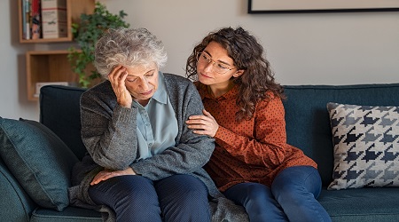 stressed family caregiver experiencing emotional burnout and fatigue